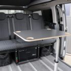 Camping table for airline rail, unfolded inside the cabin